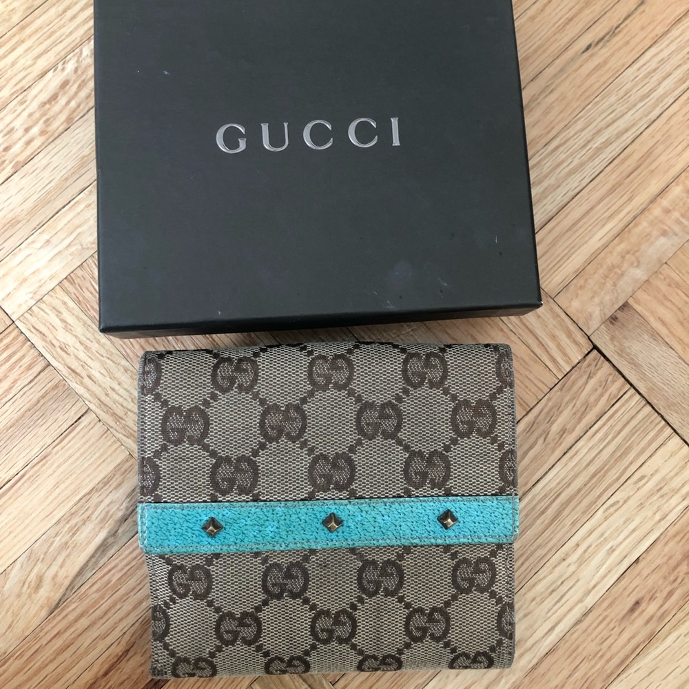 Authentic Gucci blue studded bifold wallet fair condition